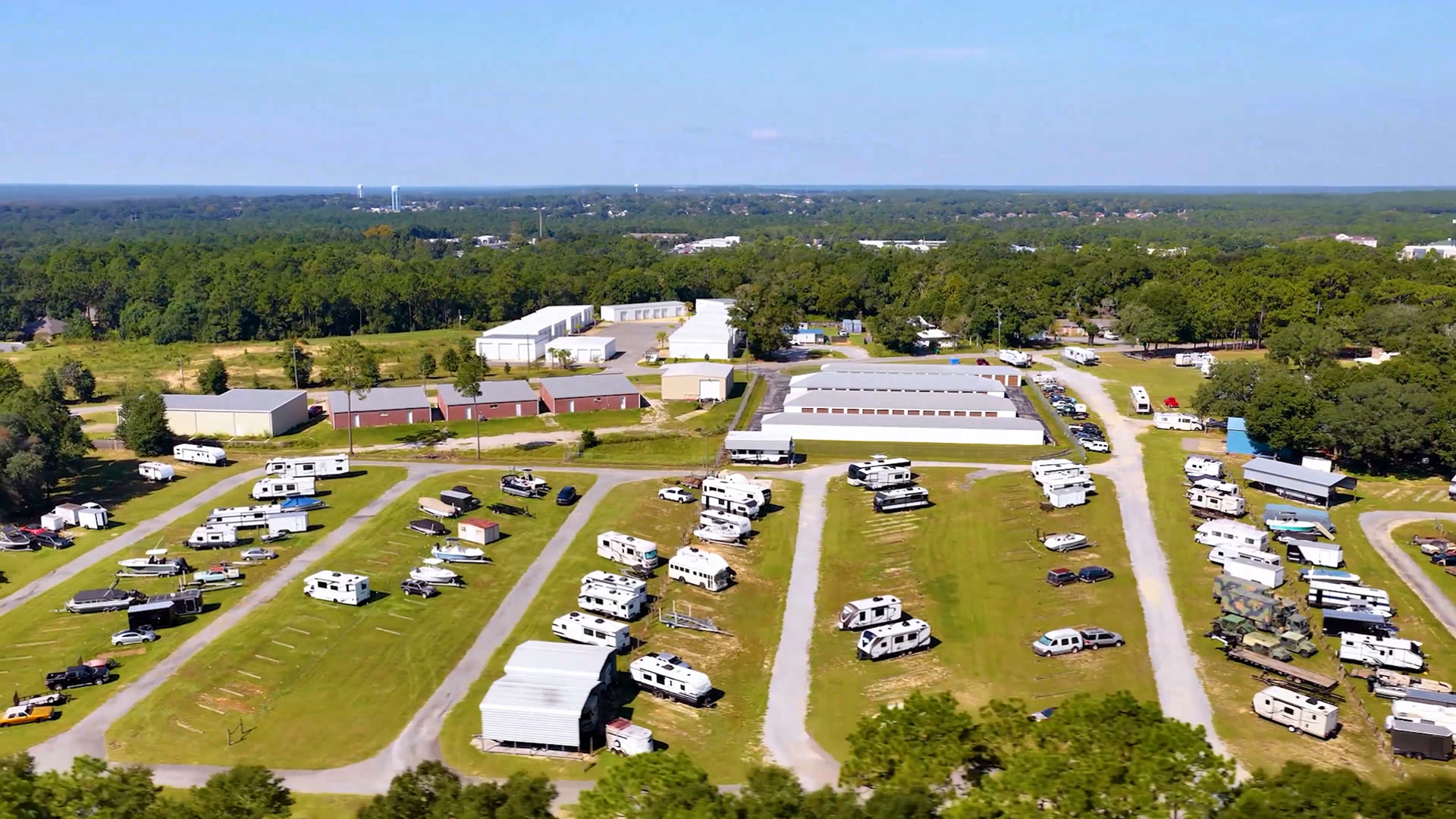 Wide aerial view of Brown's outdoor storage lanes and parked vehicles
